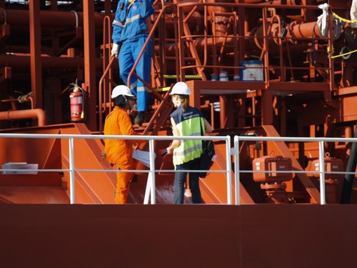 A volunteer visits a ship